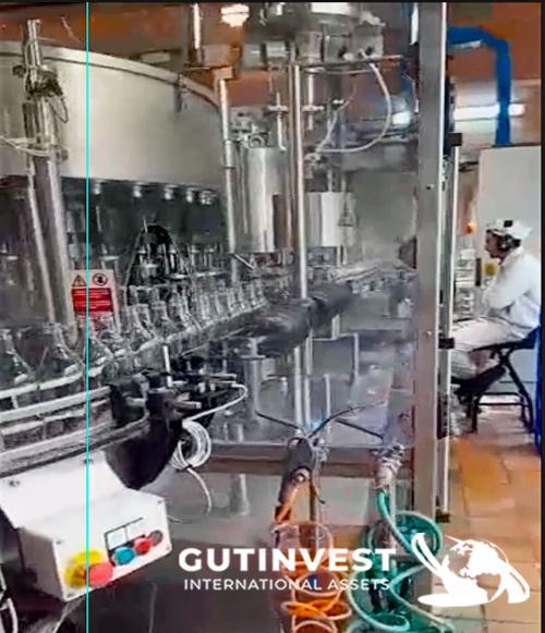Glass bottle filling machine. Capacity 10,000 bottles/hour