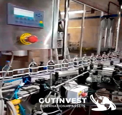 Glass bottle filling machine. Capacity 10,000 bottles/hour